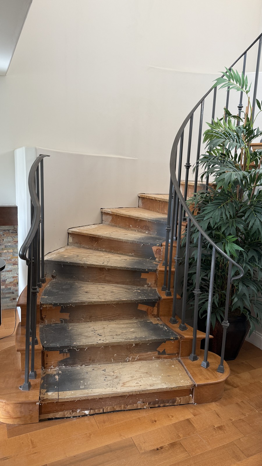 Prepping a spiral staircase for new hardwood