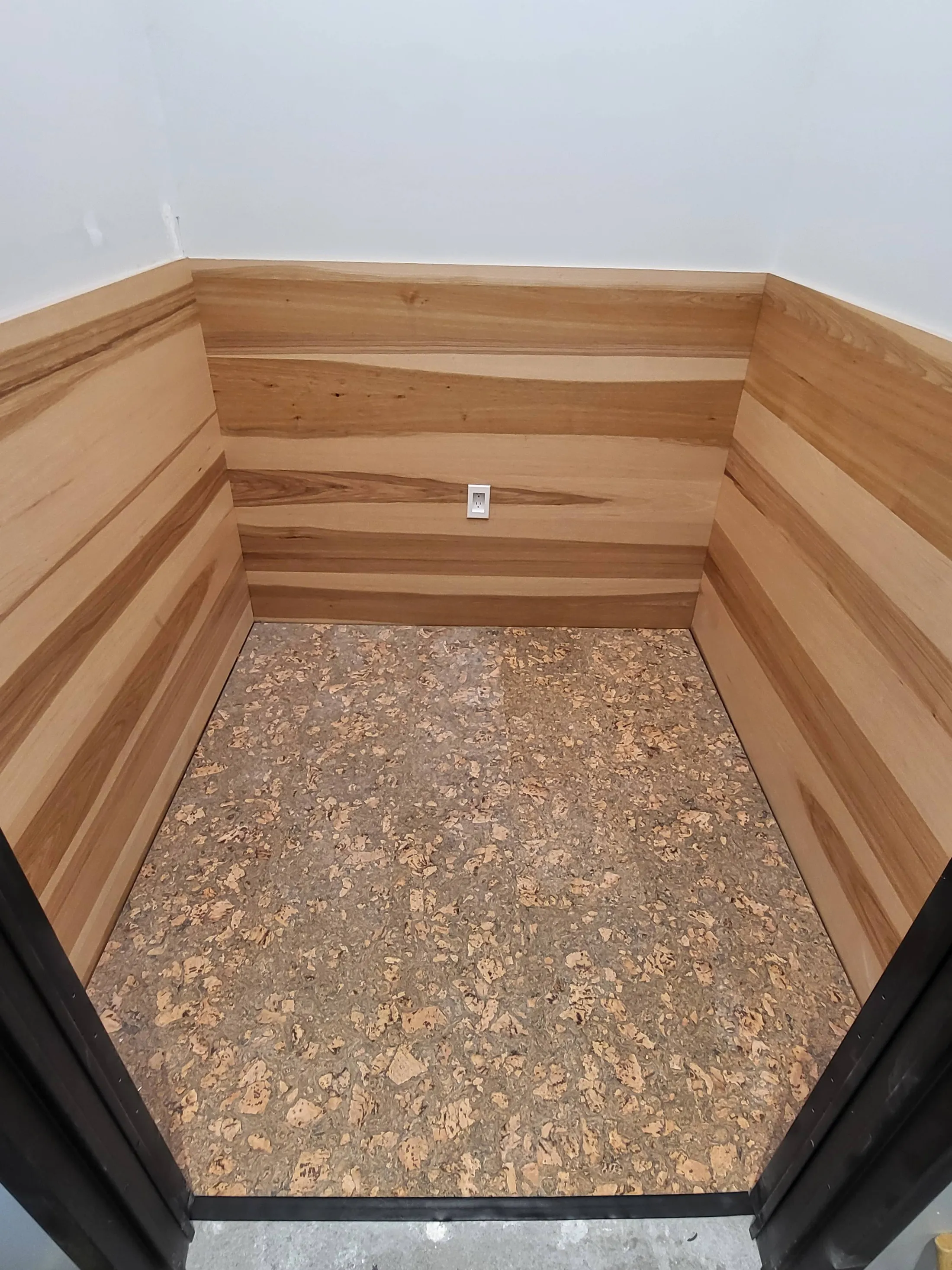 Cork underlayment exposed during closet flooring prep